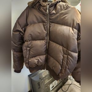 Selling Size M Brown winter coat. Brand new